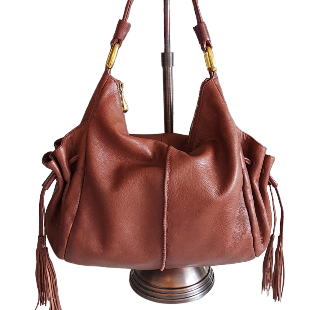 HOBO Intl shoulder hobo bag tassel drawstring pockets gold hrdwr